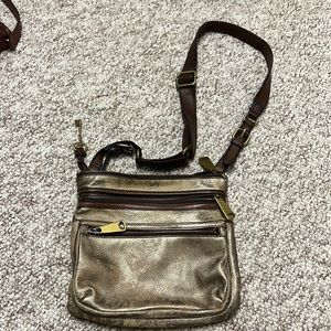 Fossil gold explorer crossbody bag
